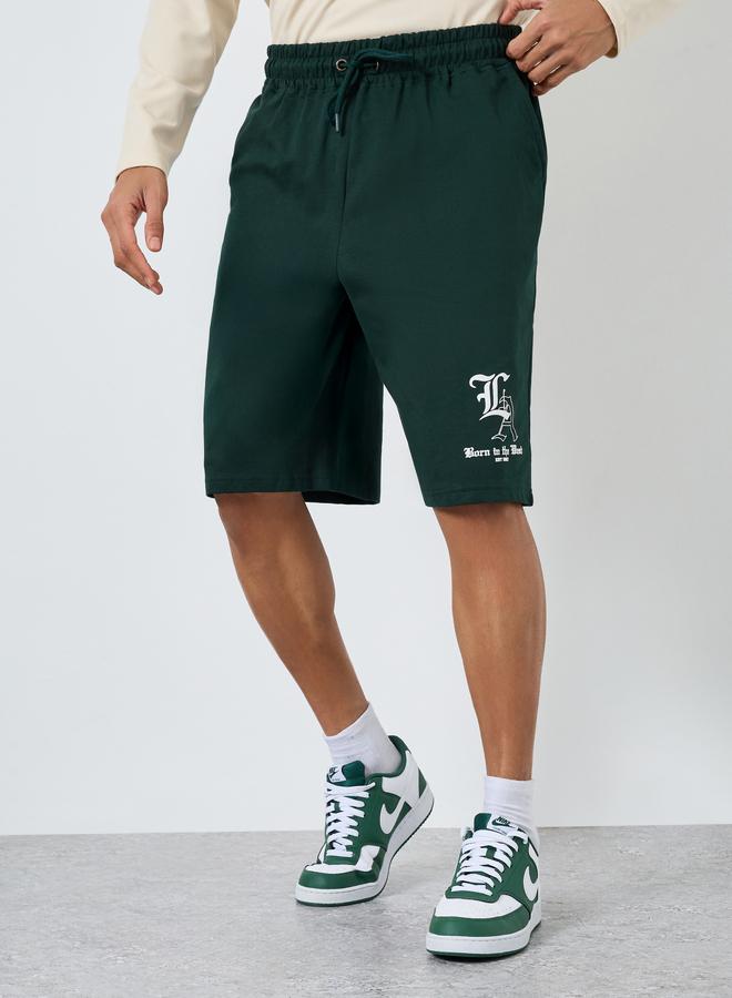 Styli Men Green Printed Oversized Shorts - Image 1
